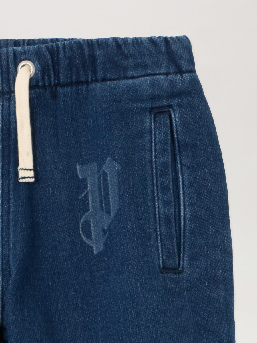 pantaloni in denim a gamba larga con lettere lavate