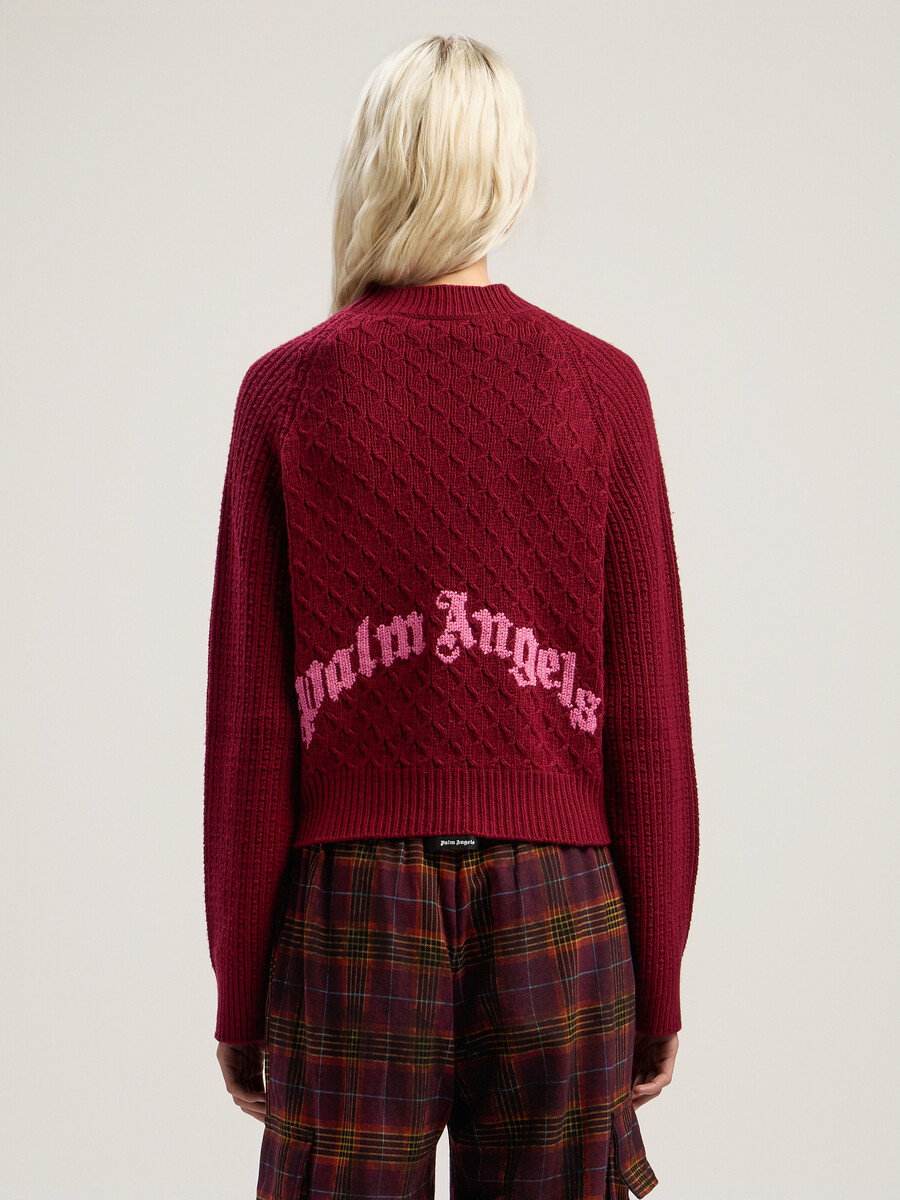 maglione a coste con logo curvo