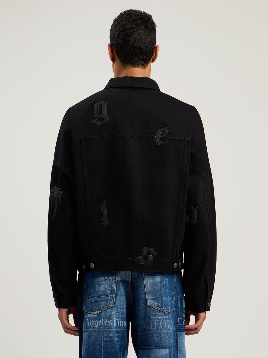 giacca in denim con logo gotico