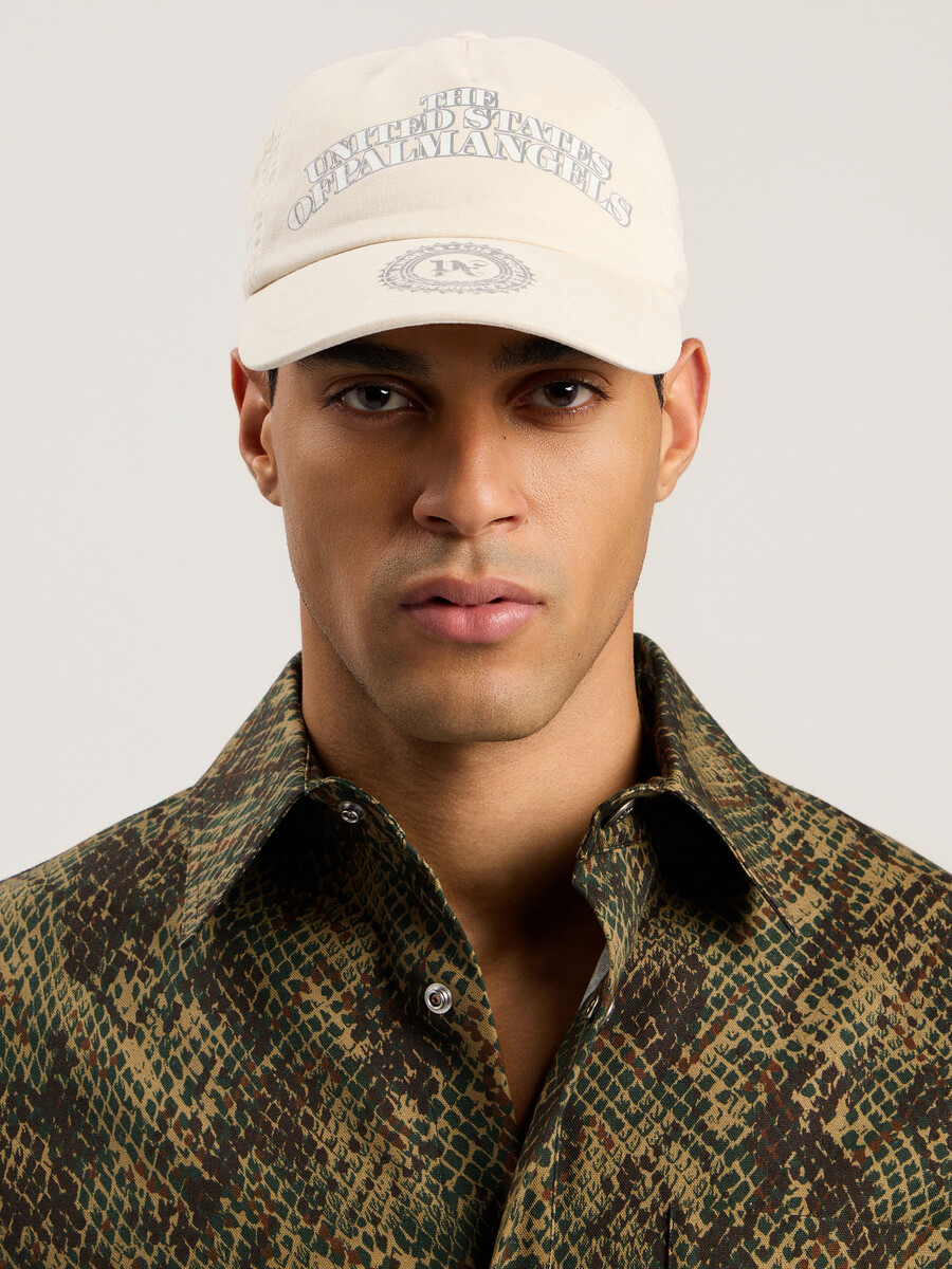 cappellino ricamato con dollaro