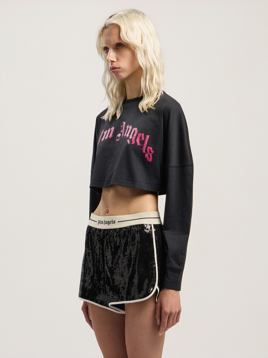 crop top a maniche lunghe con logo curvo