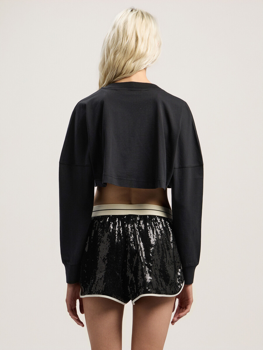 crop top a maniche lunghe con logo curvo