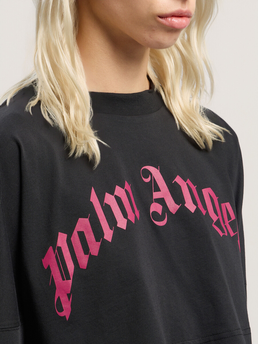 crop top a maniche lunghe con logo curvo