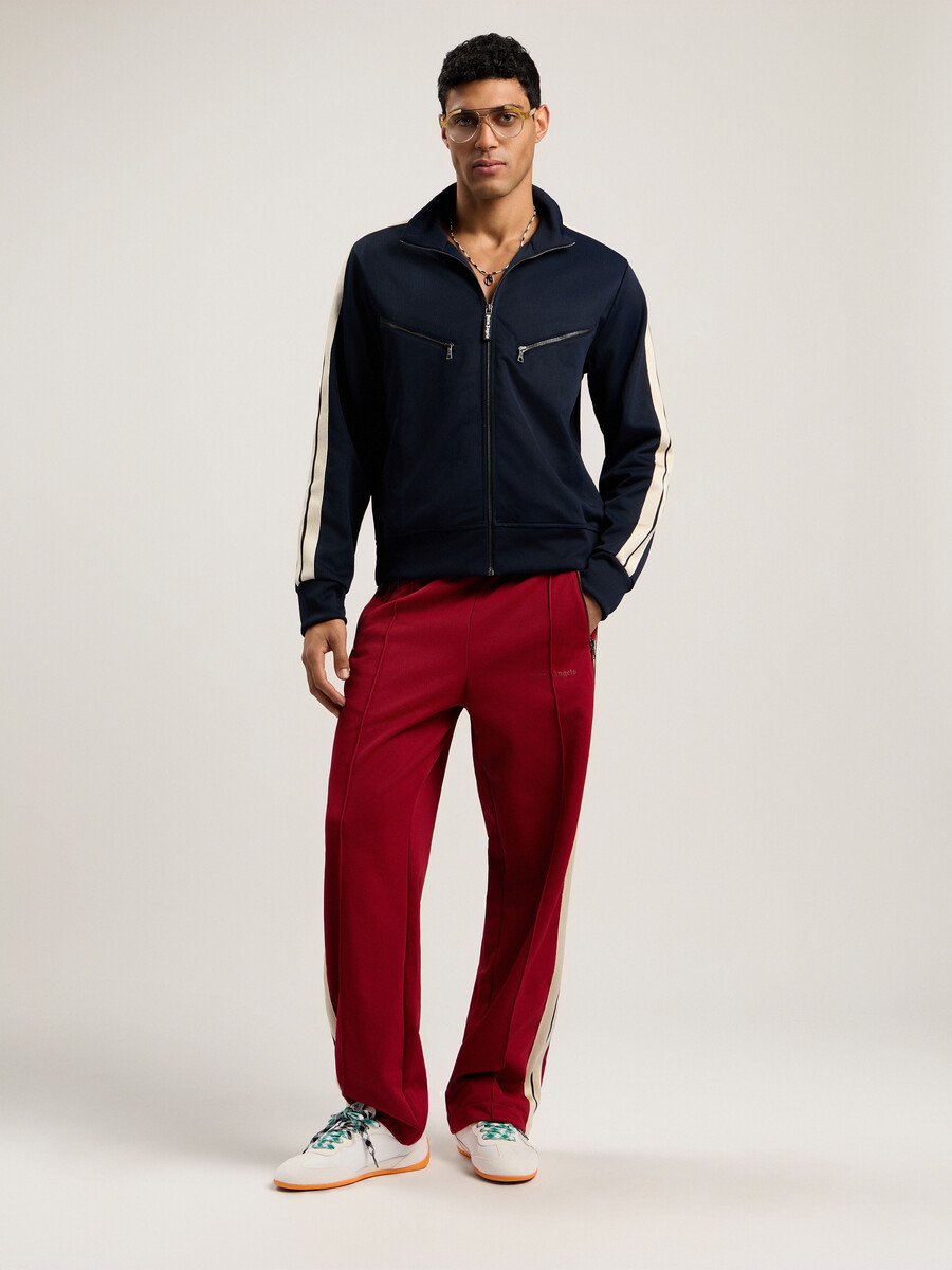 giacca sportiva con zip e logo curvo